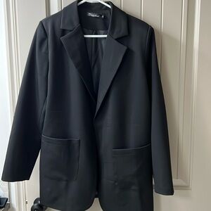 Like new black blazer. Size Large